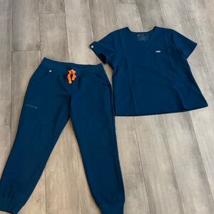 Marine Blue Scrub Set with Orange Drawstring.